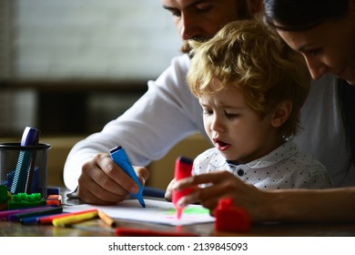 Happy family portrait having fun together. Kids early arts and crafts education, drawing. Father mother and child son drawing at home. Early childhood education, kids creative growth.