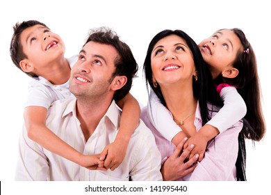 Happy Family Portrait Looking Up - Isolated Over White