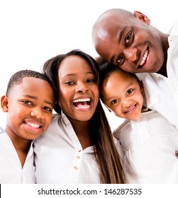 Happy family portrait smiling - isolated over a white background 