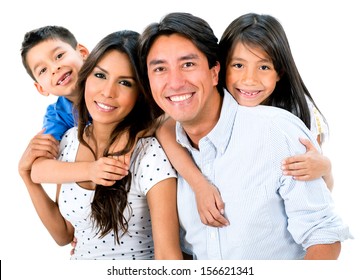 Happy family portrait smiling together - isolated over white background 
