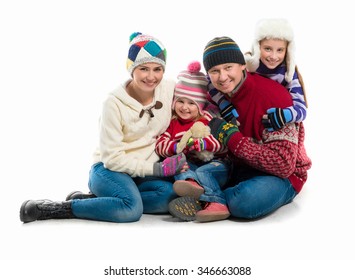 Happy Family Portrait In Warm Clothes Isolated On White Background