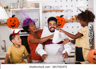 Happy Family Preparing For Halloween, Having Fun.