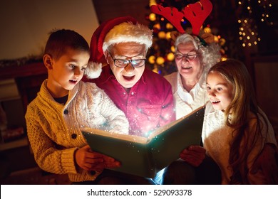 Happy Family Reading Christmas Magic Book
