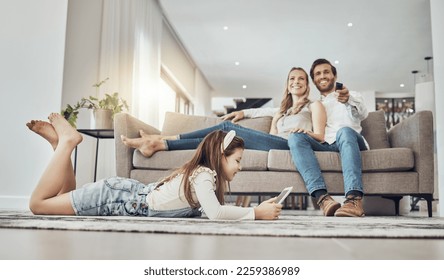 Happy family, relax or child on tablet in living room, house or home live streaming, movies channel or internet show bonding. Smile, parents or kid girl on technology, television or watching tv media - Powered by Shutterstock