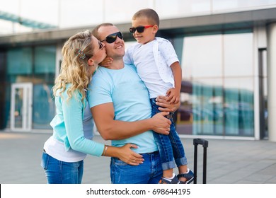 Happy Family Reunion At Airport