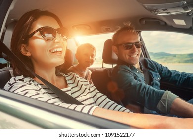 Happy family ride in the car - Shutterstock ID 1091522177
