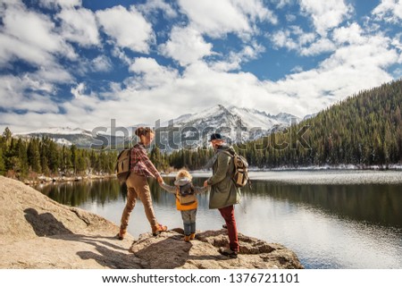 Happy family in Rocky mountains National park in USA