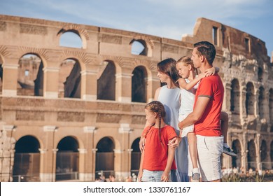 Happy family in Rome over Coliseum background. Italian european vacation together - Shutterstock ID 1330761167