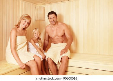 Happy Family In The Sauna