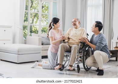 Happy Family Of Senior With Beautiful Daughter And Her Husband, Take Care Old Man Sitting On Wheelchair In House, Positive Dad Have Strength And Positive Thinking 