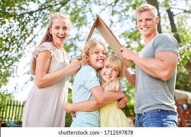 Happy Family And Sibling Children Are Looking Forward To Owning A Home