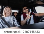 Happy family singing in car, view from inside