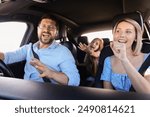 Happy family singing in car, view from inside