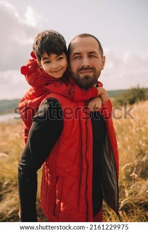 Similar – Family totem play outfoor happy in spring