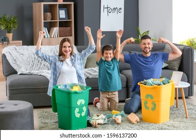 Happy Family Sorting Garbage At Home. Concept Of Recycling