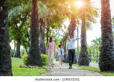 Happy Family Spending Time Together Outside In Green Nature,Relaxed Lifestyle.