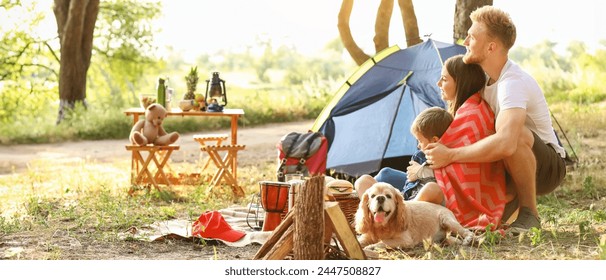 Happy family spending weekend in forest - Powered by Shutterstock