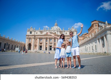 Happy family at St. Peter's Basilica church in Vatican city. Travel parents and kids on european vacation in Italy.