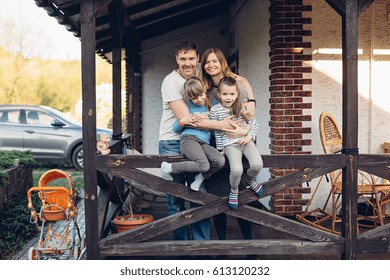 A Happy Family At Their Country House