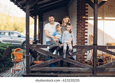 A Happy Family At Their Country House