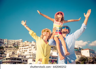 Happy Family Traveling. People Having Fun In Old European Town. Summer Holiday And Vacation Concept