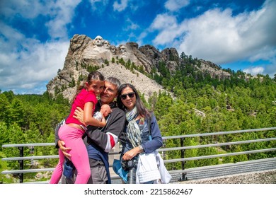 Happy Family Visiting Mt Rushmore Tourist Attraction