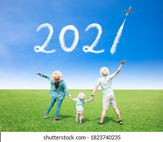 Happy  Family  Watching The Sky And Celebrating New Year 2021 Concepts