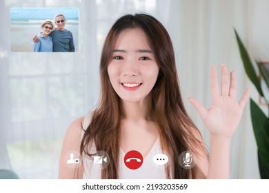 Happy Family Webcam Laptop Screen View Asian Woman Doing Remotely Video Conference Calling Online. Multi Generational Family Videocall Distant Travel Concept.