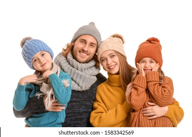 Happy Family In Winter Clothes On White Background