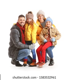 Happy Family In Winter Clothes On White Background