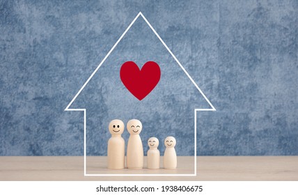 Happy Family Wooden Dolls With Red Heart Inside Home Icon On Blue Background, Warm Family Concept