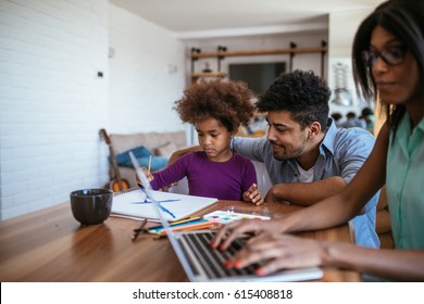 Happy family working and having fun at home. - Shutterstock ID 615408818