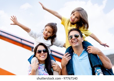 Happy Family Wth Two Kids Traveling By Airplane