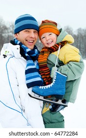 Happy Family, Young Father Going Ice Skating With His Little Son