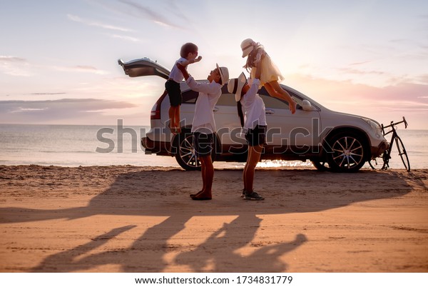 Happy family. young mom
with her daughter ready for getting ready for trip. image not
focus,Concept family and Holiday and car travel.copy space for put
text