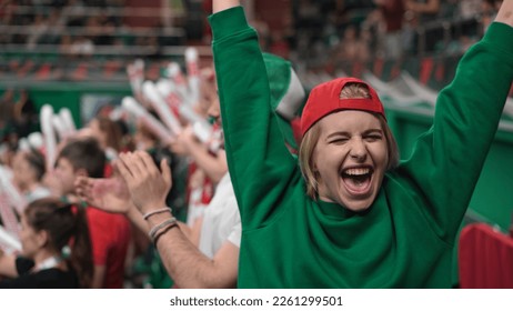 Happy fans football sport stadium arena. Emotion crowd clap applaud. Smile woman watch cup. Female look camera. Wild girl enjoy goal score. Game event stand. Win play. Fan cheer team tribune close up. - Shutterstock ID 2261299501