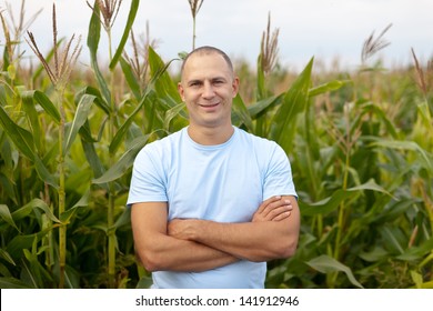 Happy  Farmer In Field Of Corn