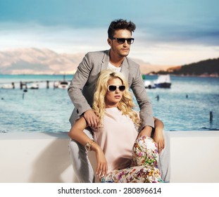 Happy Fashionable Couple On Sunny Vacation Day