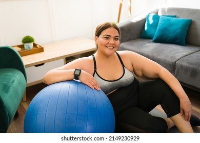 Happy Fat Active Young Woman. Excited Plus Size Woman Smiling While Finishing Her Pilates Workout At Home 