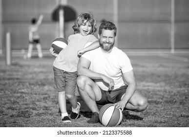 Happy Father And Child Playing Basketball With Ball Outdoor, Childhood