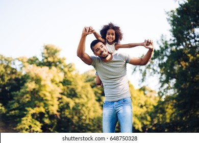 Happy Father And Child Spending Time Outdoors