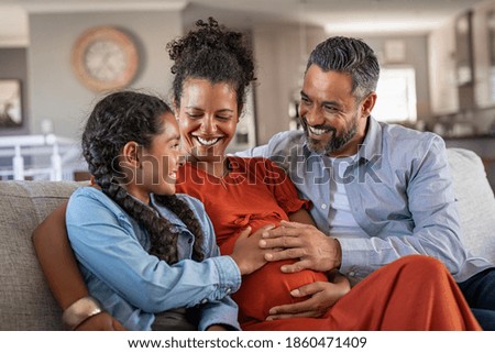 Similar – Image, Stock Photo Happy pregnant woman hugging her stomach