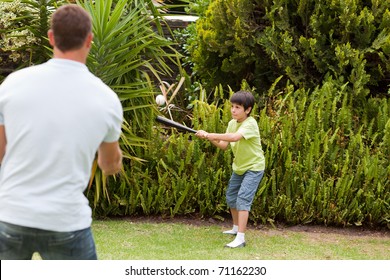 Happy Father And His Son Playing Baseball