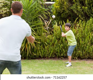 Happy Father And His Son Playing Baseball