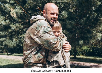 Happy Father And Son In Camouflage Outside In Park, Father's Day Concept And Greetings, Laser Tag Military War Game For Birthday Party, Father Return Home Family Reunion