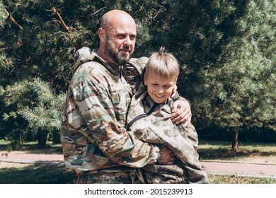 Happy Father And Son In Camouflage Outside In Park, Father's Day Concept And Greetings, Laser Tag Military War Game For Birthday Party, Father Return Home Family Reunion