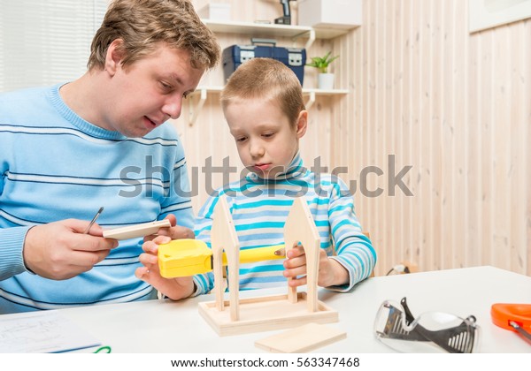 Happy Father Son Garage Built Bird Stock Photo Edit Now 563347468