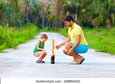 happy father and son making chemical experiment, funny education - Powered by Shutterstock