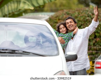 Happy Father And Son Smiling Getting Into Ther Car