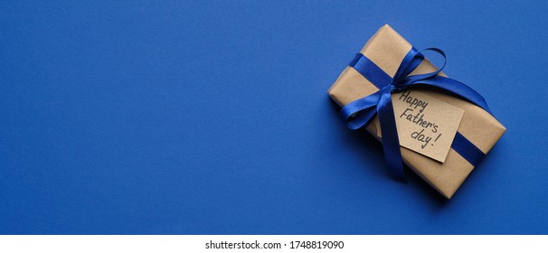 Happy Fathers Day Banner Template. Top View Vintage Gift Box With Label Happy Father's Day On Blue Background With Copy Space.